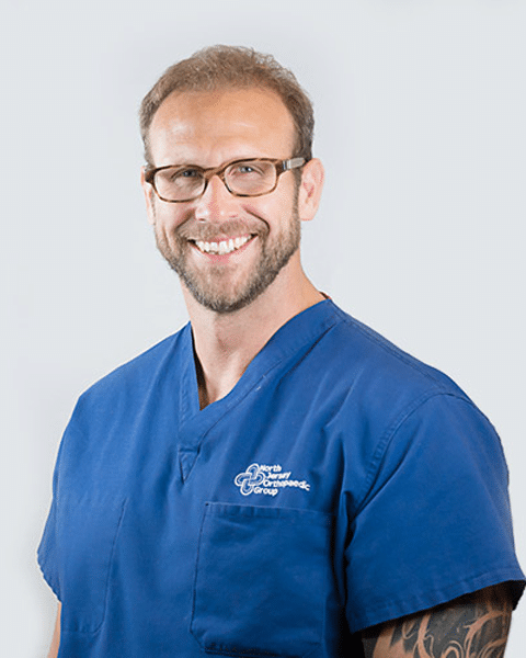 Dr. Garrick Cox